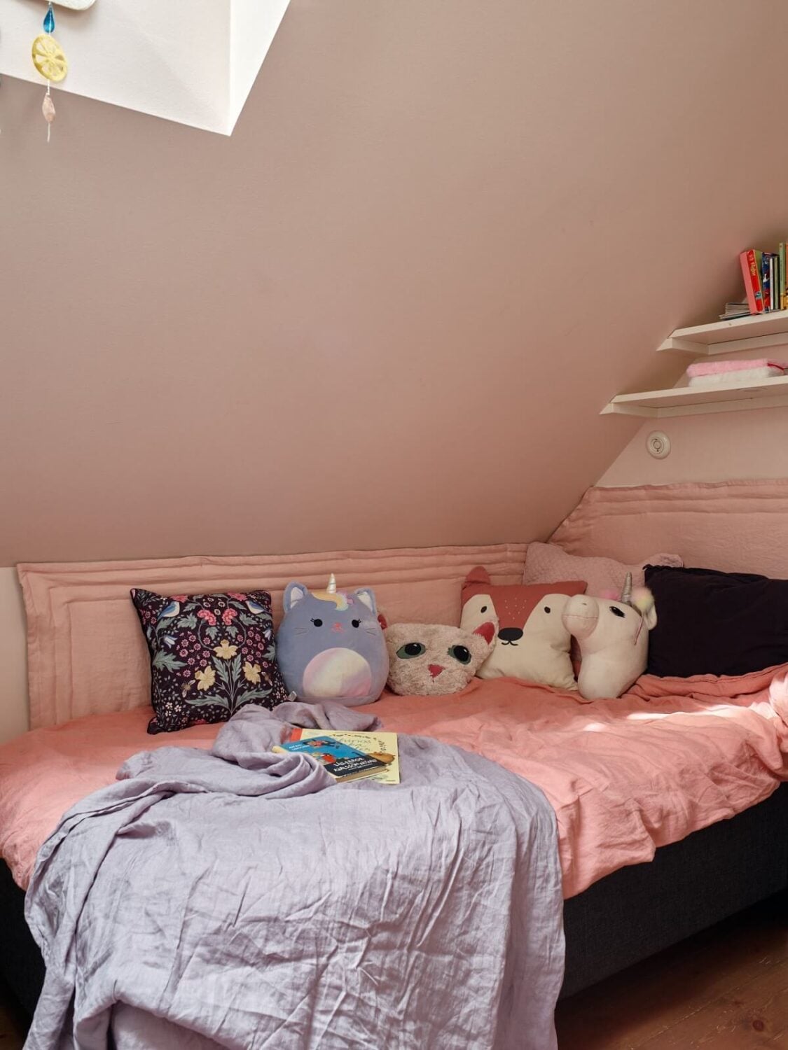 A Cozy Vintage Bohemian Maisonette in Sweden 28 attic-kids-bedroom-slanted-ceiling-nordroom
