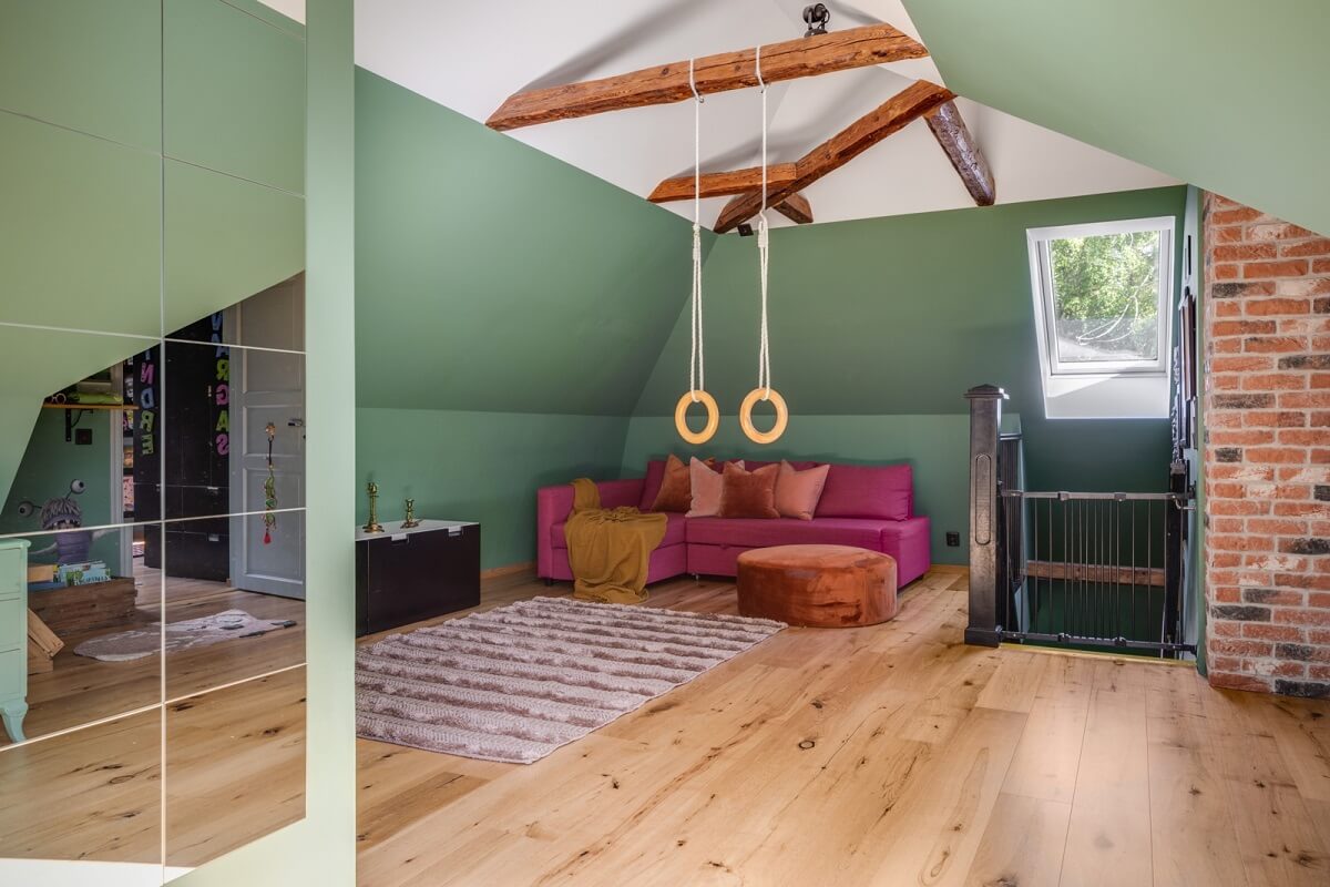 A Colorful Family Home in a Former School Building 25 attic-room-green-walls-exposed-beams-nordroom