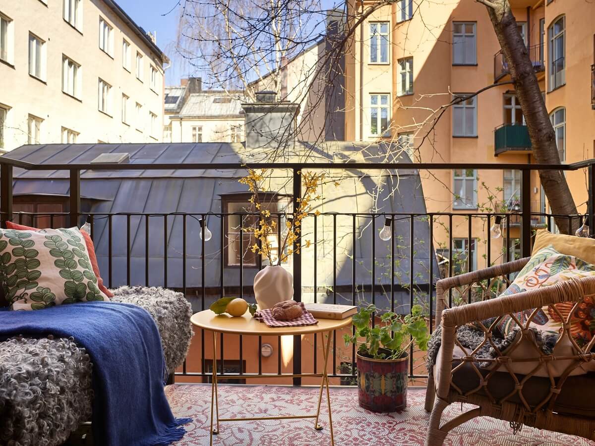 A Bedroom with Yellow French Wallpaper in a Small Scandi Home 17 balcony-charming-scandinavian-apartment-nordroom