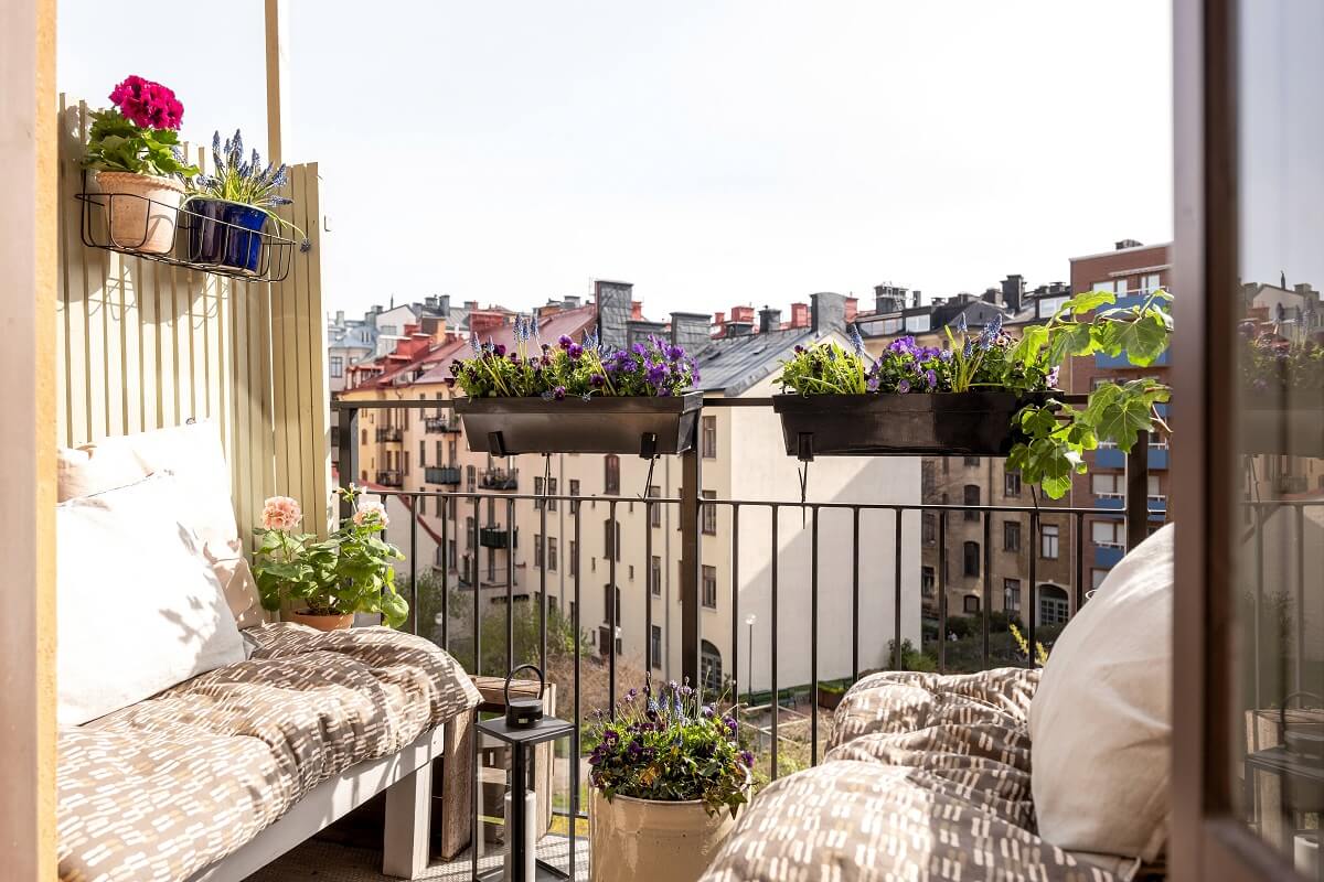 A Nordic Home with Blue Sitting Room and Kitchen 27 balcony-small-colorful-apartment-sweden-nordroom