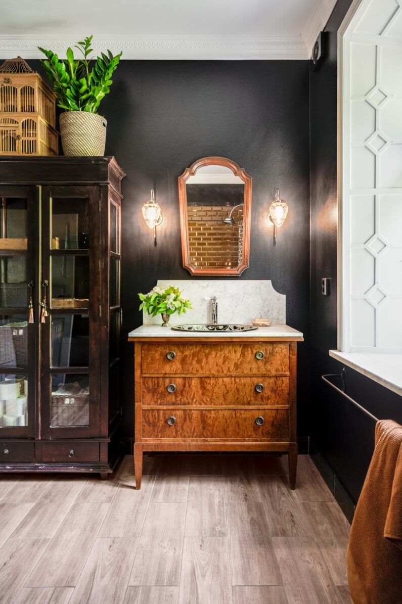 A Colorful Family Home in a Former School Building 21 bathroom-black-walls-antique-cabinet-nordroom