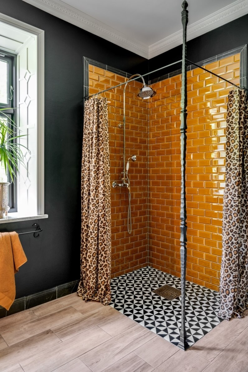 A Colorful Family Home in a Former School Building 23 bathroom-black-walls-orange-tiles-black-white-floor-tiles-nordroom