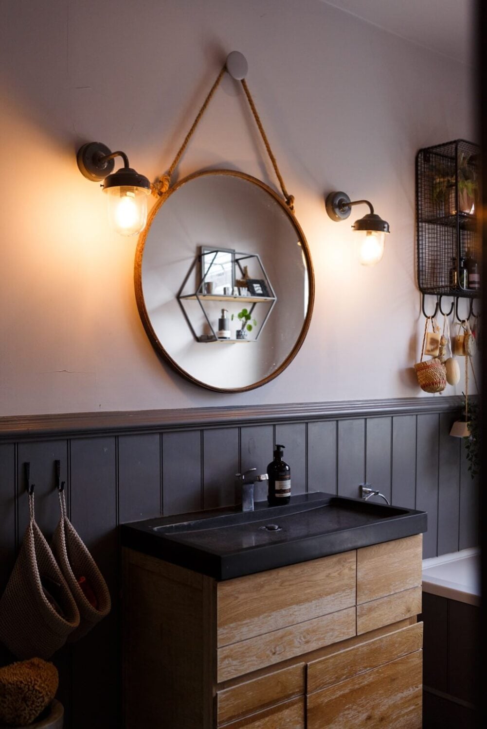 A Colorful Maximalist Home in London 38 bathroom-round-mirror-black-sink-nordroom