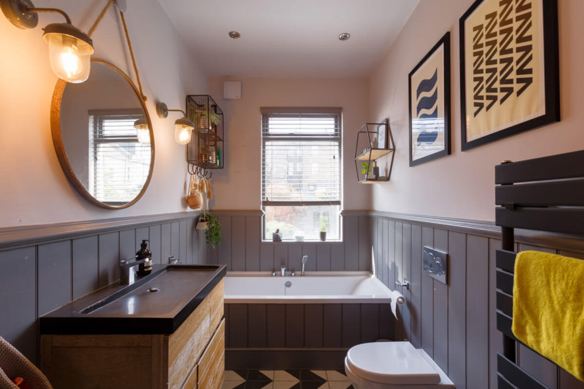 A Colorful Maximalist Home in London 37 bathroom-round-mirror-black-white-floor-tiles-bath-nordroom