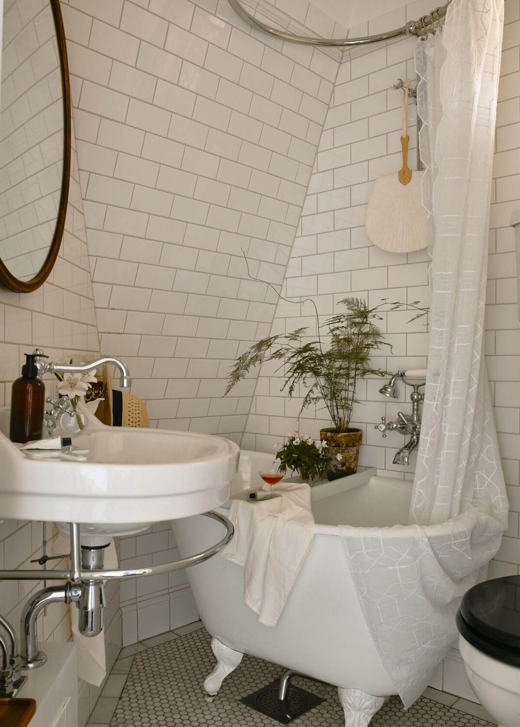 A Cozy Vintage Bohemian Maisonette in Sweden 24 bathroom-subway-tiles-small-freestanding-bath-nordroom