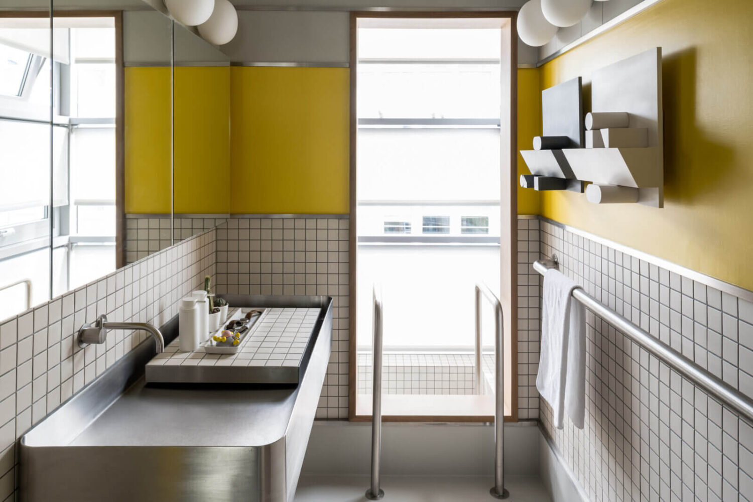 A Spectacular Modern Black Loft in London 17 bathroom-yellow-color-accents-nordroom