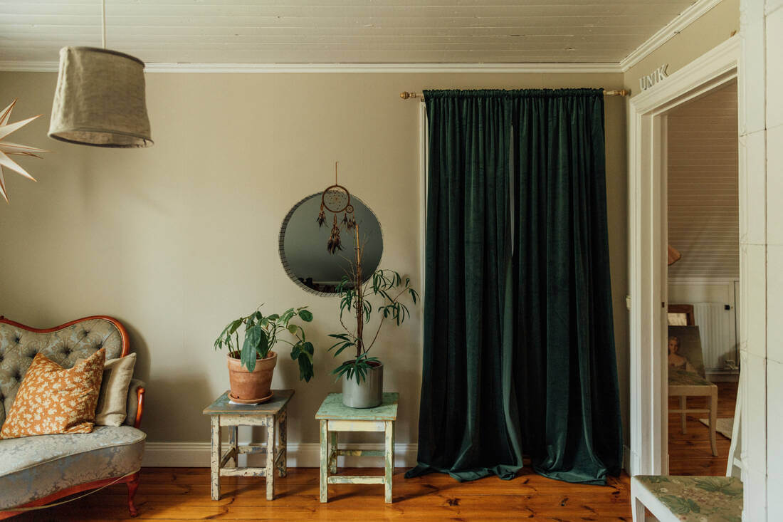 A Vintage Bohemian Country House in Sweden 11 bedroom-antique-sofa-velvet-curtains-nordroom