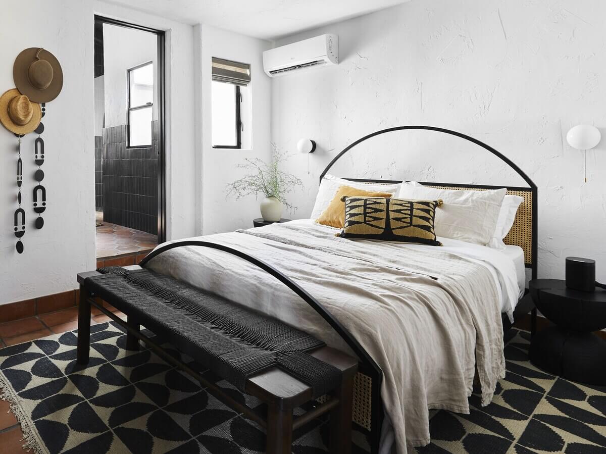 Queer Eye's Bobby Berk Designed An Airbnb Villa in California 14 bedroom-black-grey-rug-airbnb-california-nordroom