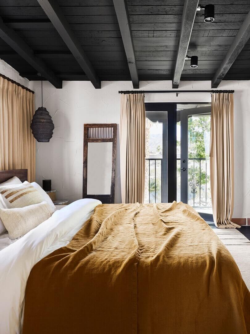 Queer Eye's Bobby Berk Designed An Airbnb Villa in California 8 bedroom-black-painted-wooden-floor-nordroom