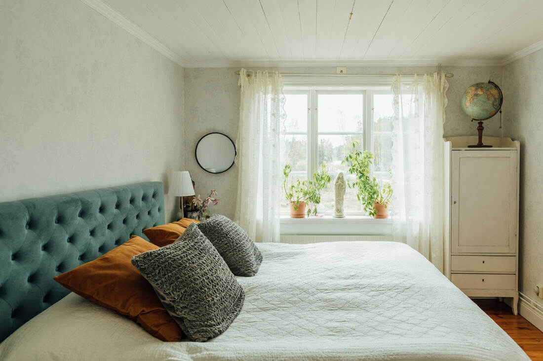 A Vintage Bohemian Country House in Sweden 9 bedroom-blue-headboard-vintage-boho-home-sweden-nordroom