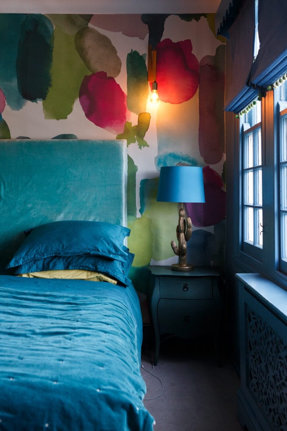 A Colorful Maximalist Home in London 31 bedroom-sea-green-bedding-window-frames-colorful-wallpaper-nordroom