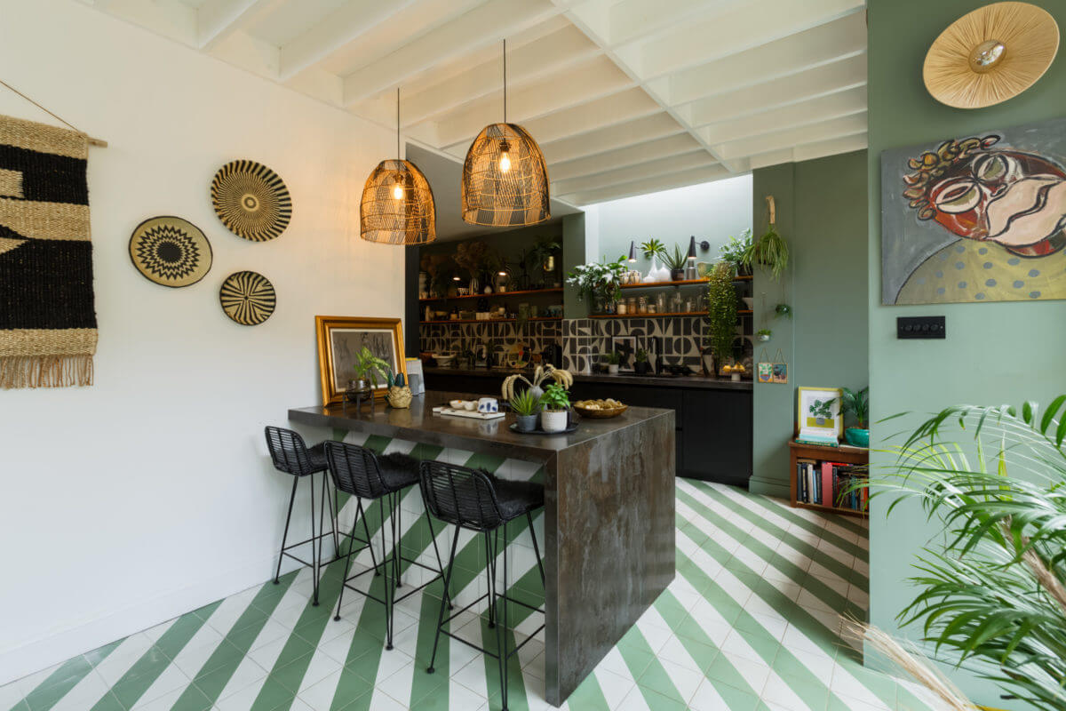 A Colorful Maximalist Home in London 4 black-breakfast-island-green-walls-kitchen-nordroom