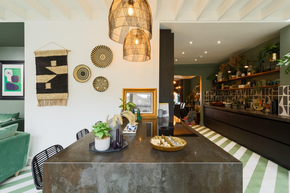 A Colorful Maximalist Home in London 5 black-breakfast-island-kitchen-green-walls-open-shelves-nordroom