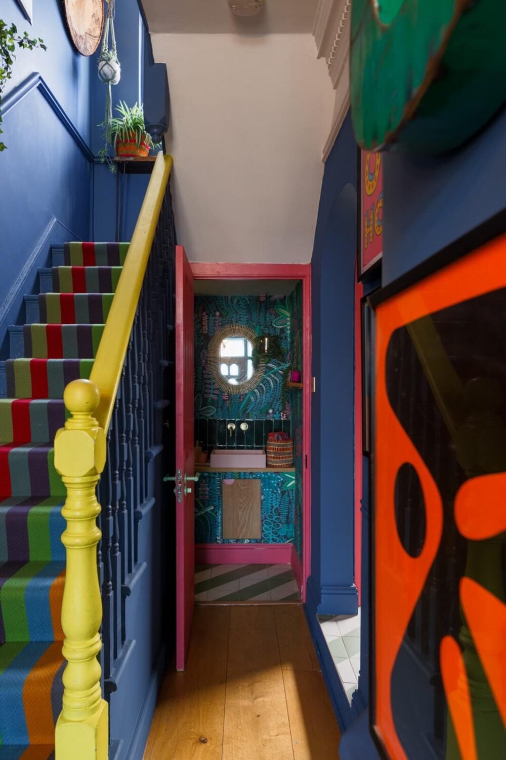 A Colorful Maximalist Home in London 29 blue-hallway-colorful-stair-runner-nordroom