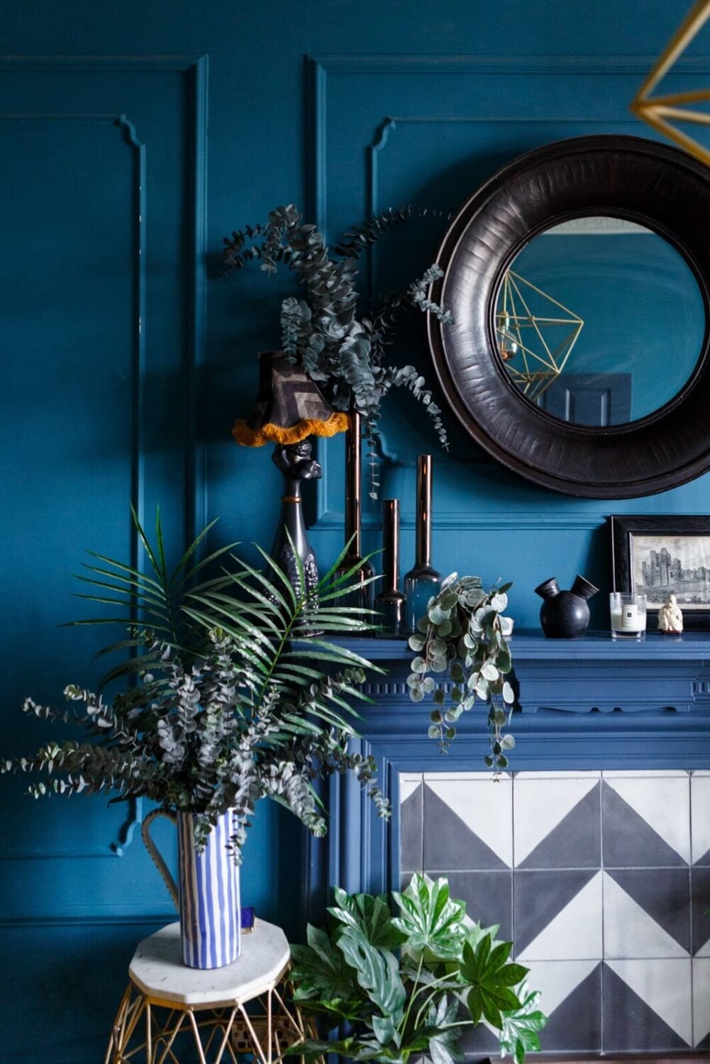 A Colorful Maximalist Home in London 26 blue-sitting-room-edwardian-house-round-mirror-fireplace-black-white-tiles-nordroom