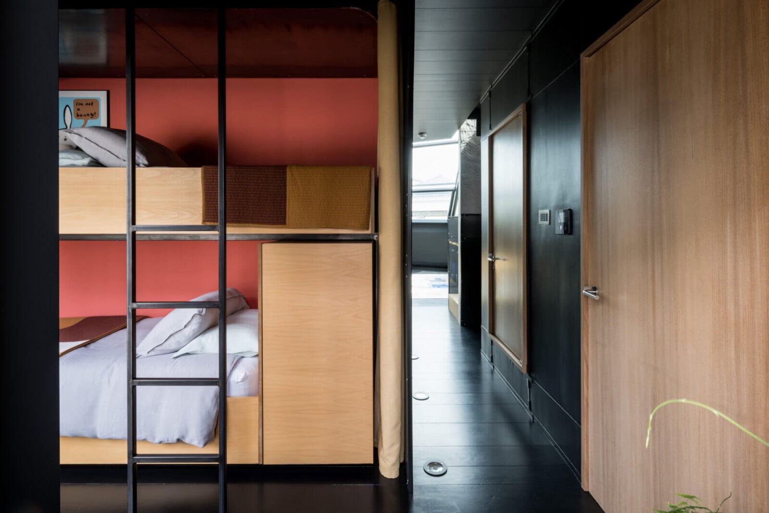 A Spectacular Modern Black Loft in London 23 bunk-beds-guest-room-black-floor-nordroom
