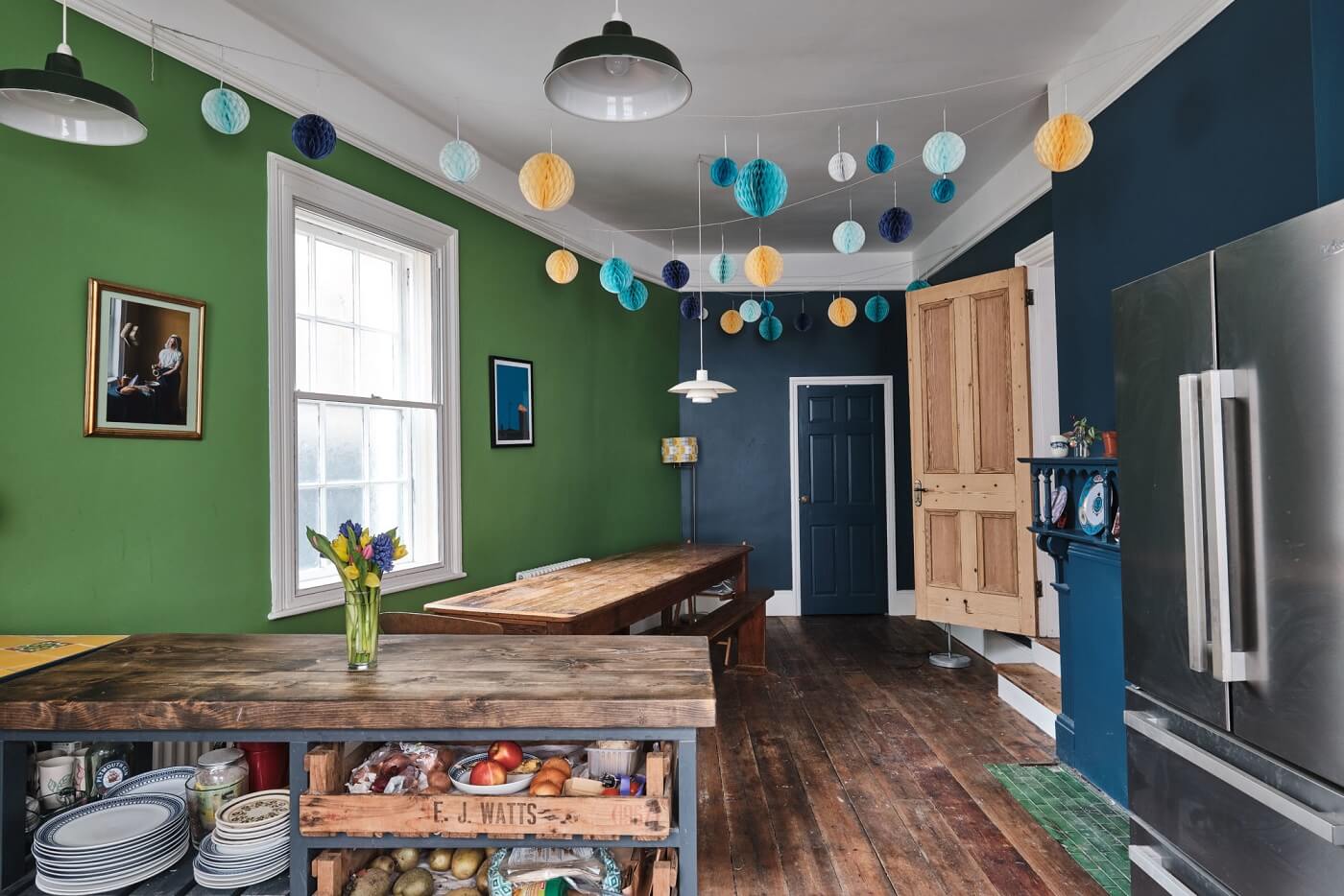 A Colorful Eclectic Home in England 17 colorful-eclectic-home-green-kitchen-wooden-floor-nordroom
