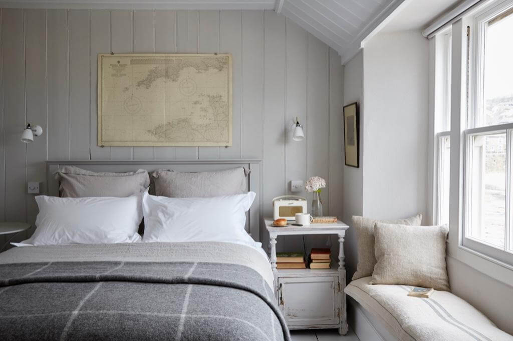 A Beautiful Seaside Cottage in Cornwall 7 cottage-bedroom-light-gray-walls-window-seat-nordroom