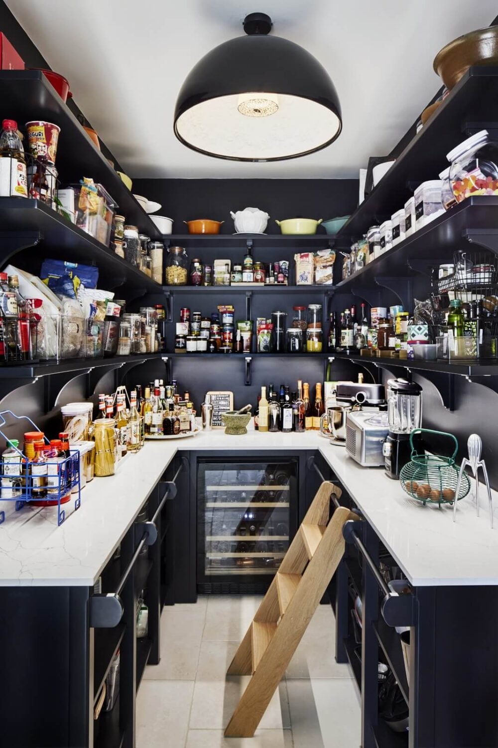 An Arts and Crafts House with Colorful Rooms 12 dark-blue-pantry-open-shelves-nordroom