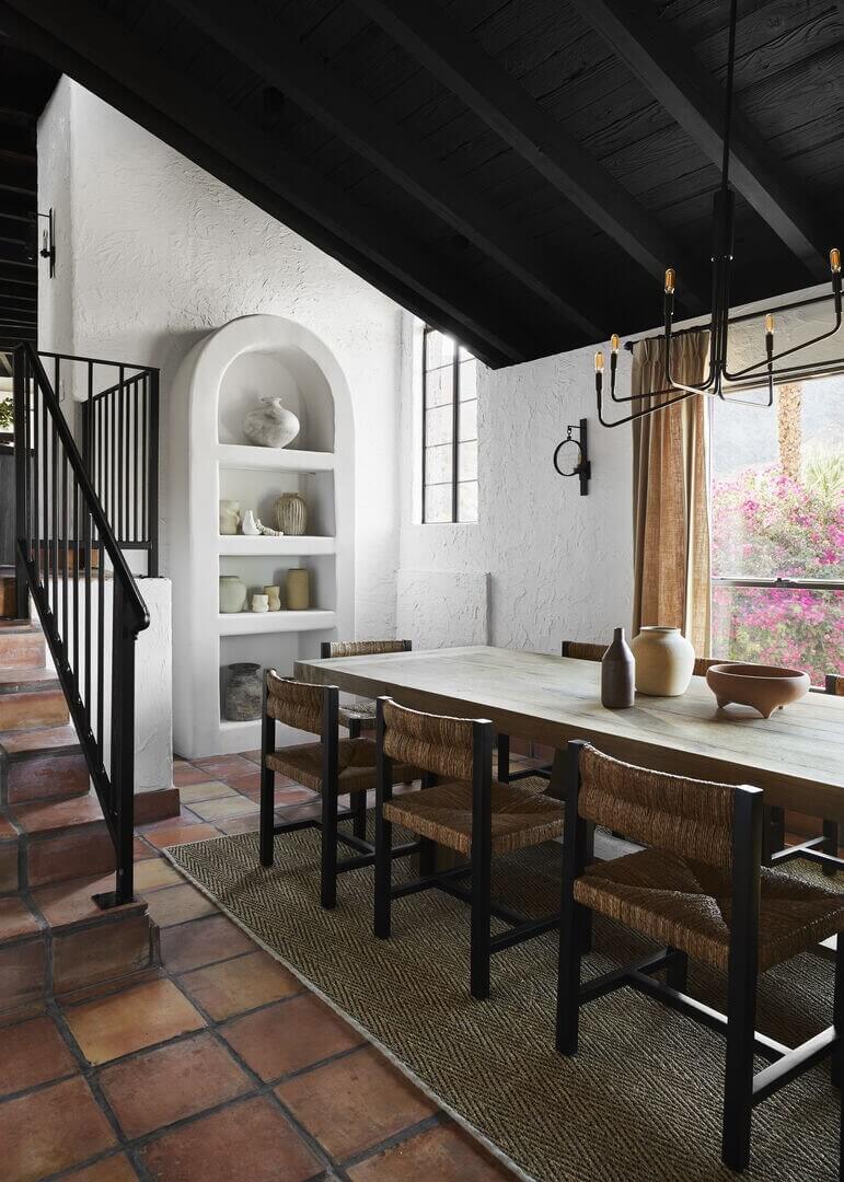 Queer Eye's Bobby Berk Designed An Airbnb Villa in California 4 dining-room-stone-floor-black-painted-wooden-ceiling-nordroom