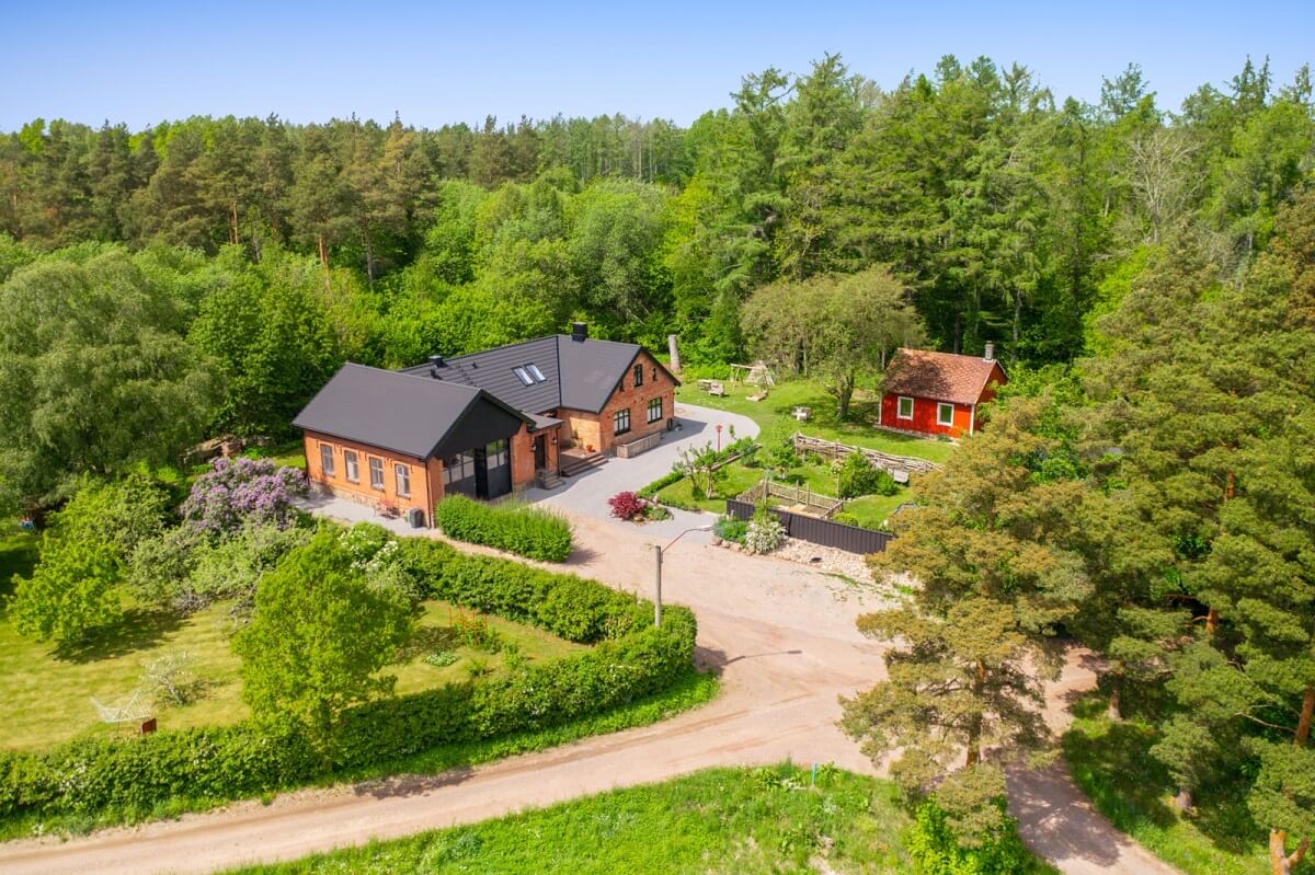 A Colorful Family Home in a Former School Building 46 exterior-garden-colorful-eclectic-country-house-sweden-nordroom