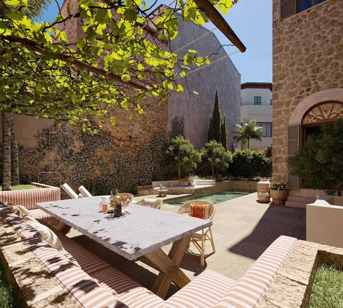 Best of 2022: Outdoor Spaces 1 garden-built-in-seating-swimming-pool-townhouse-mallorca-nordroom