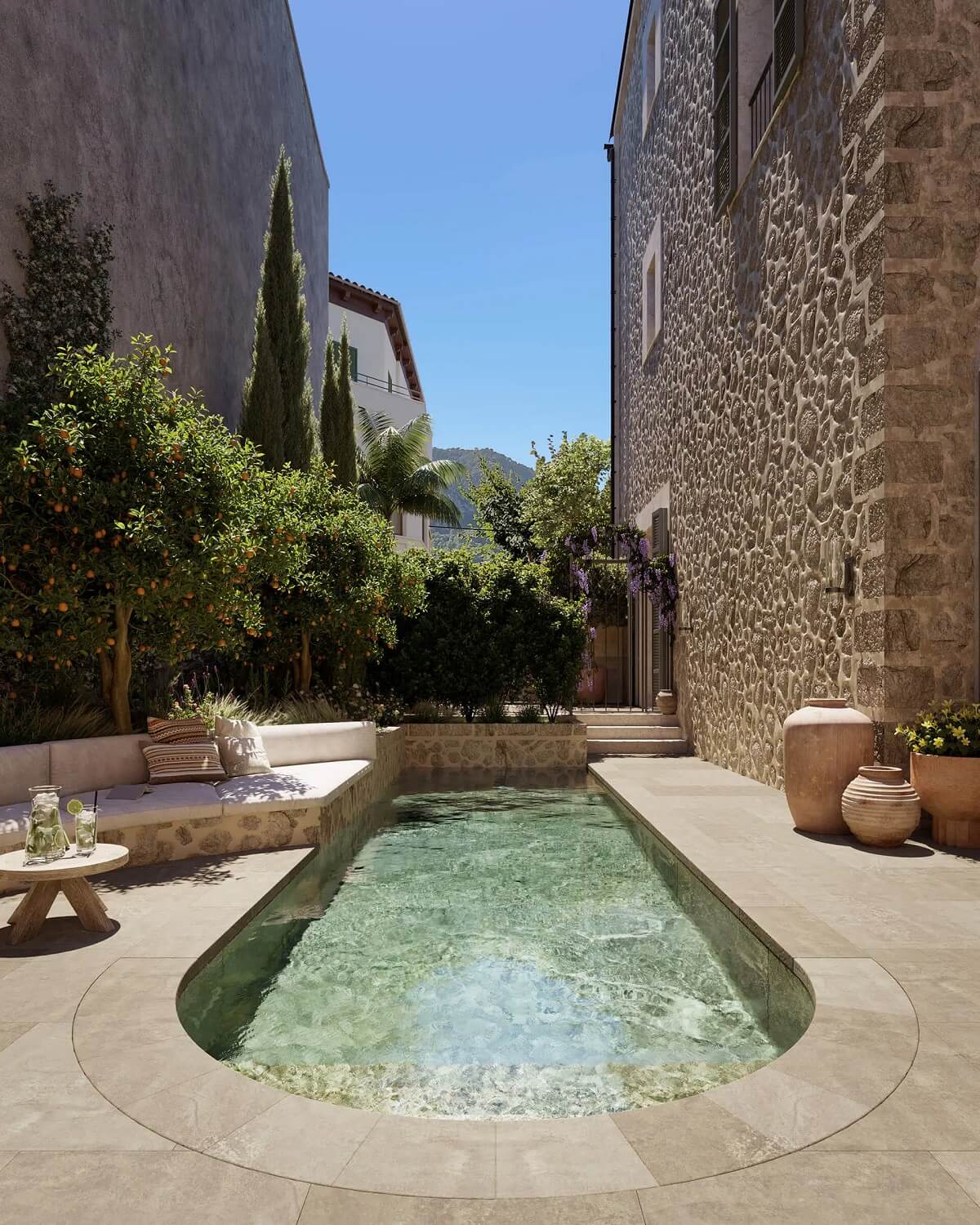 A Townhouse on Mallorca Combines Historic Charm and Modern Design 11 garden-round-swimming-pool-townhouse-mallorca-nordroom