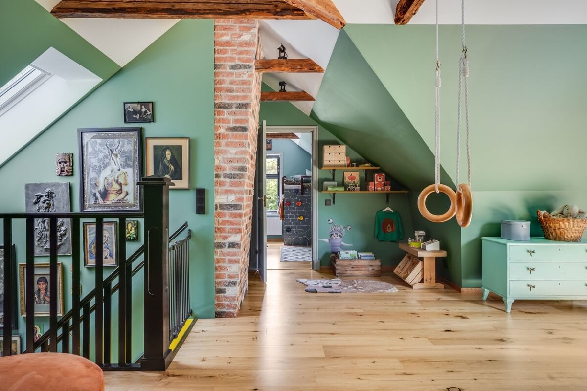 A Colorful Family Home in a Former School Building 26 green-attic-playroom-exposed-beams-nordroom