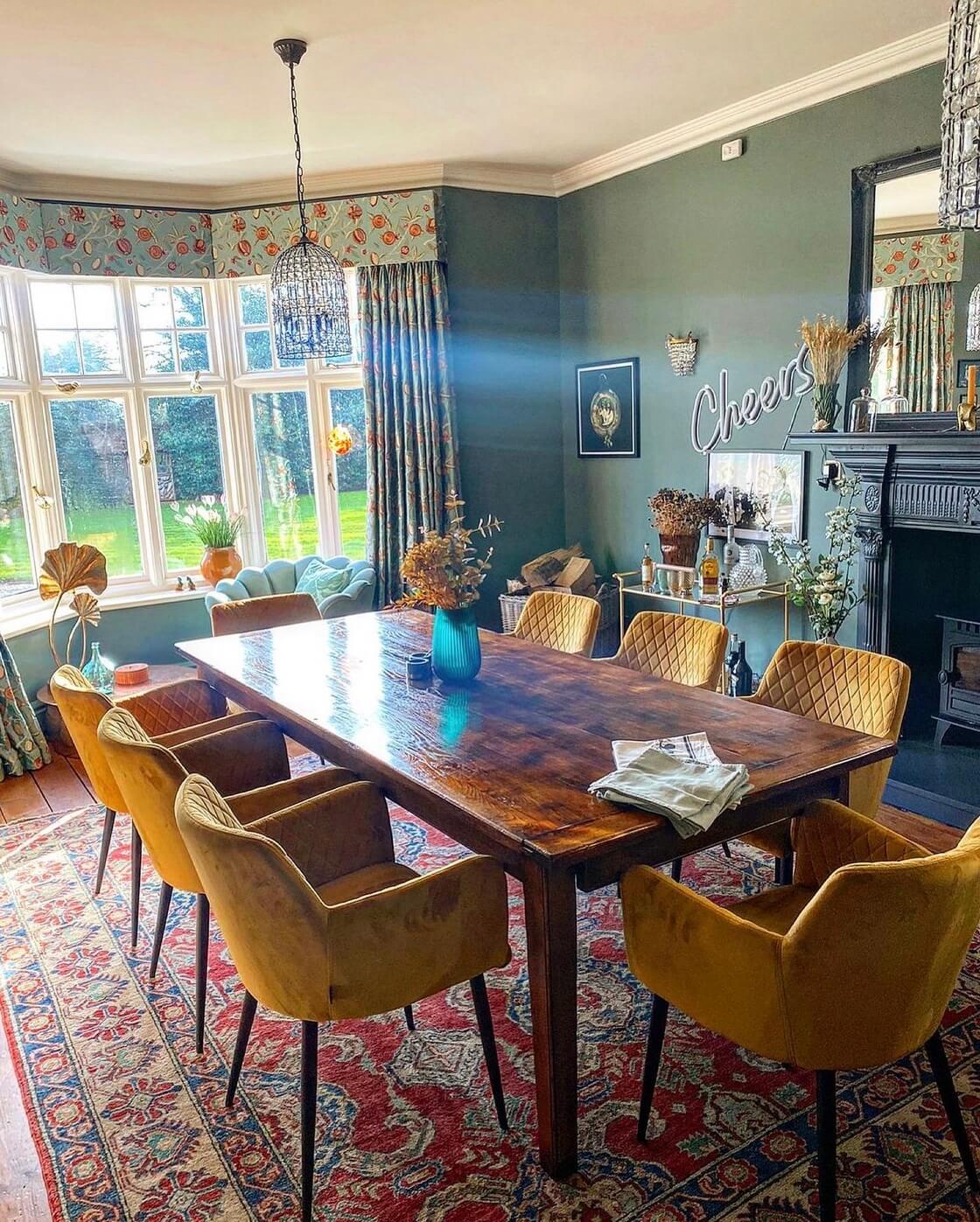 A Wonderful Eclectic Maximalist Home in England 13 green-dining-room-yellow-velvet-dining-chairs-nordroom