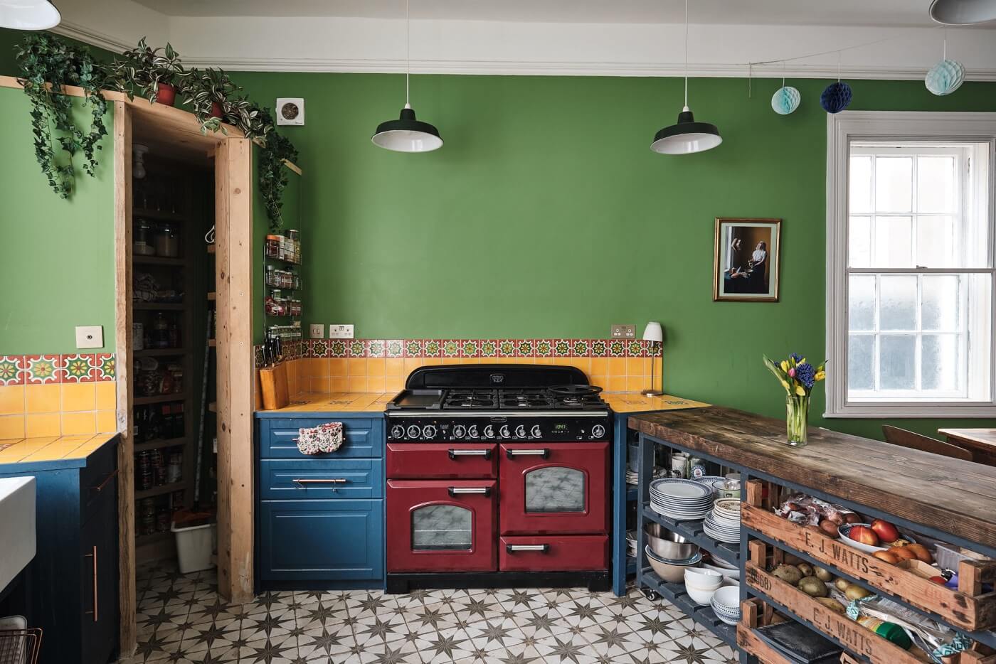 A Colorful Eclectic Home in England 16 green-walls-blue-kitchen-cabinets-yellow-tiles-colorful-eclectic-home-nordroom