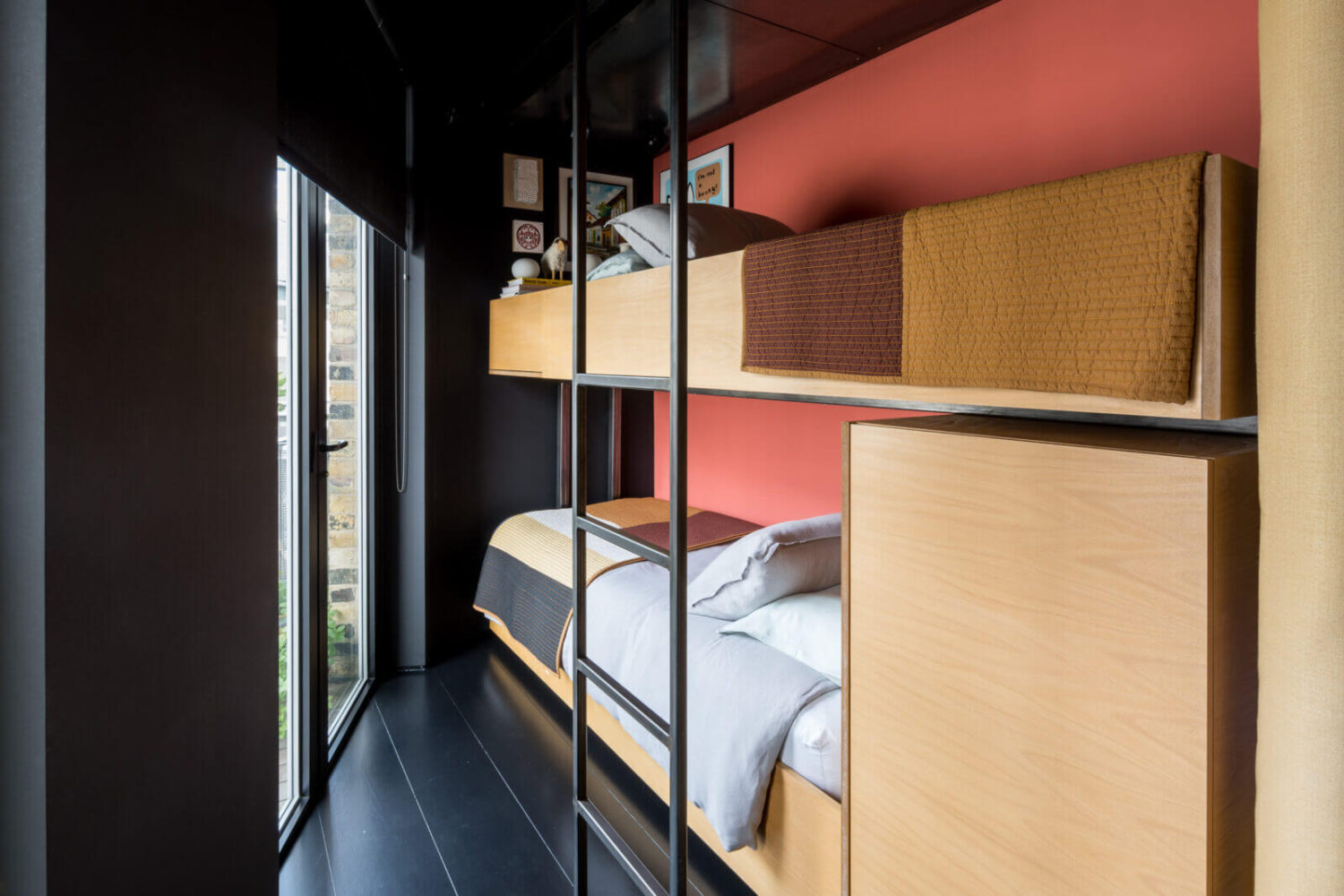 A Spectacular Modern Black Loft in London 22 guest-room-bunk-bed-black-wooden-floor-nordroom
