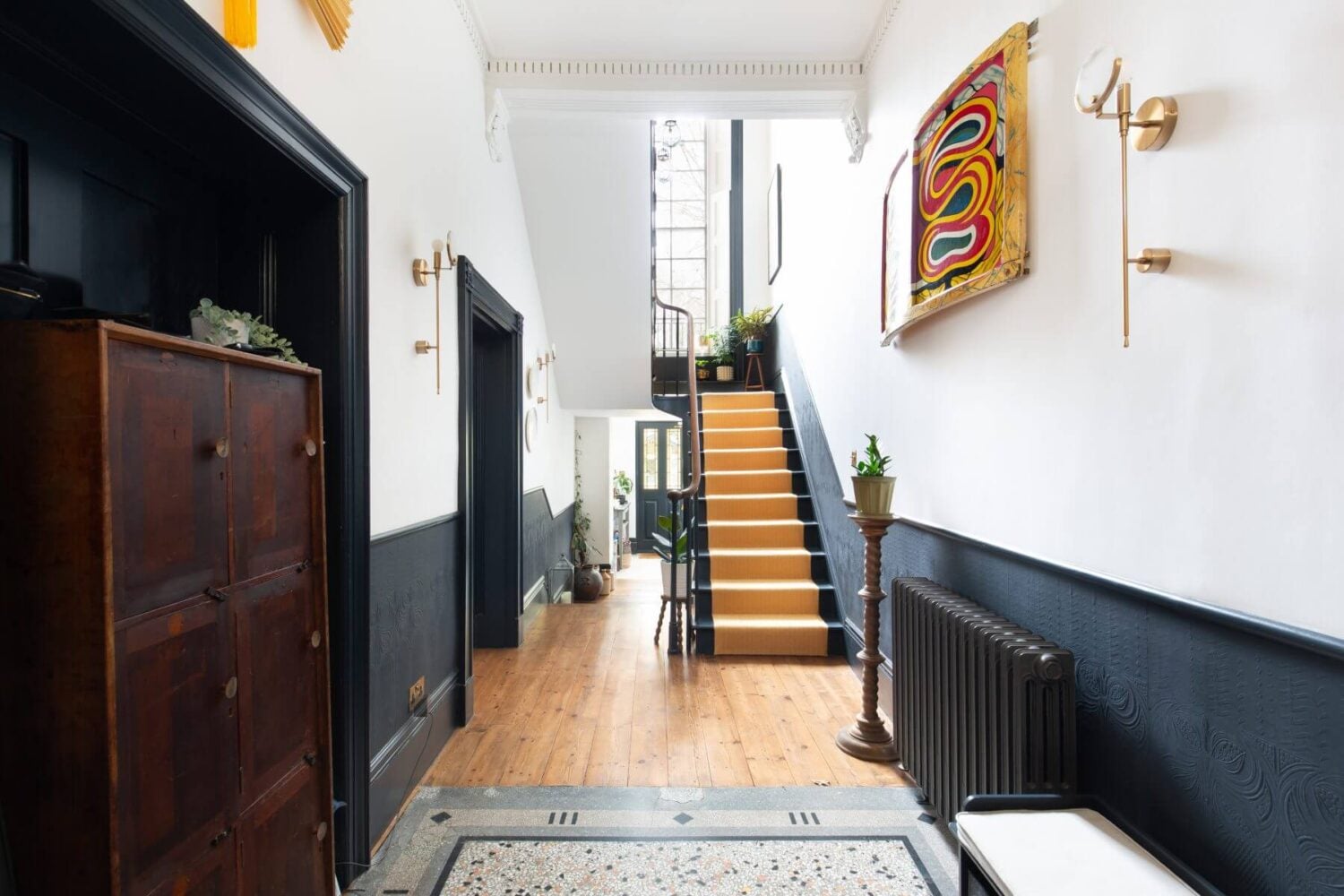 A Colorful Georgian Home in London 15 hallway-black-woodn-panels-nordroom