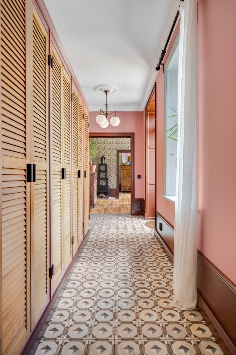 A Colorful Family Home in a Former School Building 39 hallway-pink-walls-floor-tiles-wardrobes-nordroom