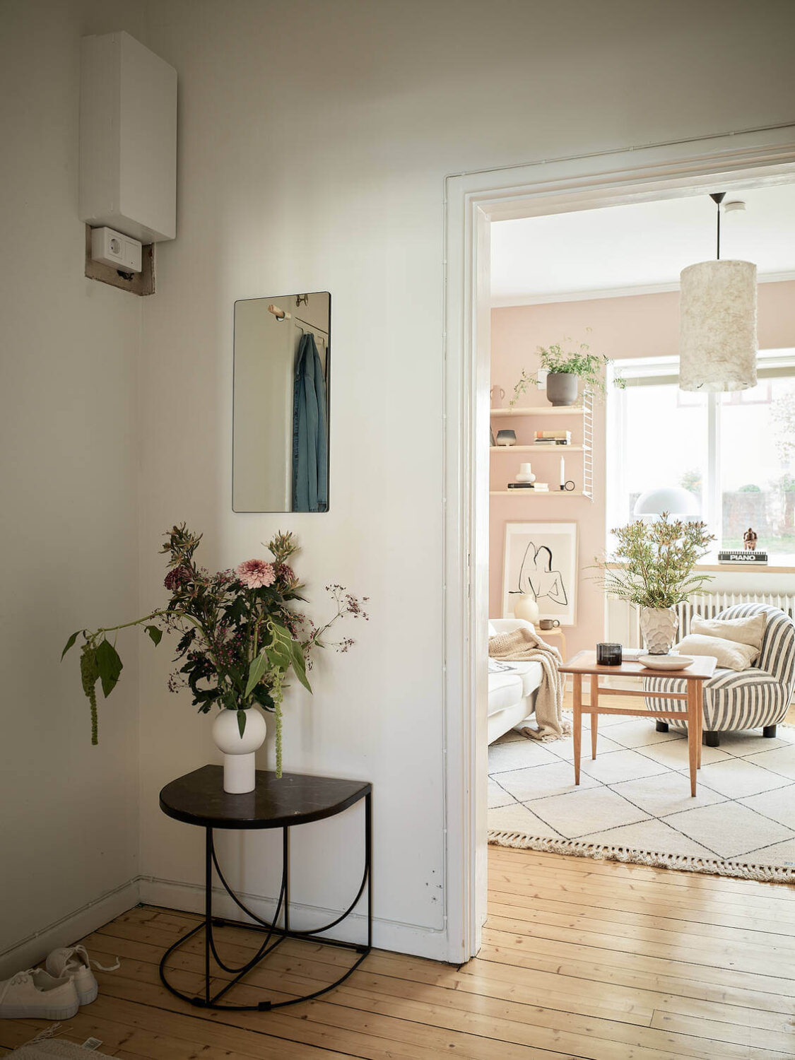 A Pink Studio Apartment with Green Bathroom 15 hallway-wooden-floor-pink-studio-nordroom