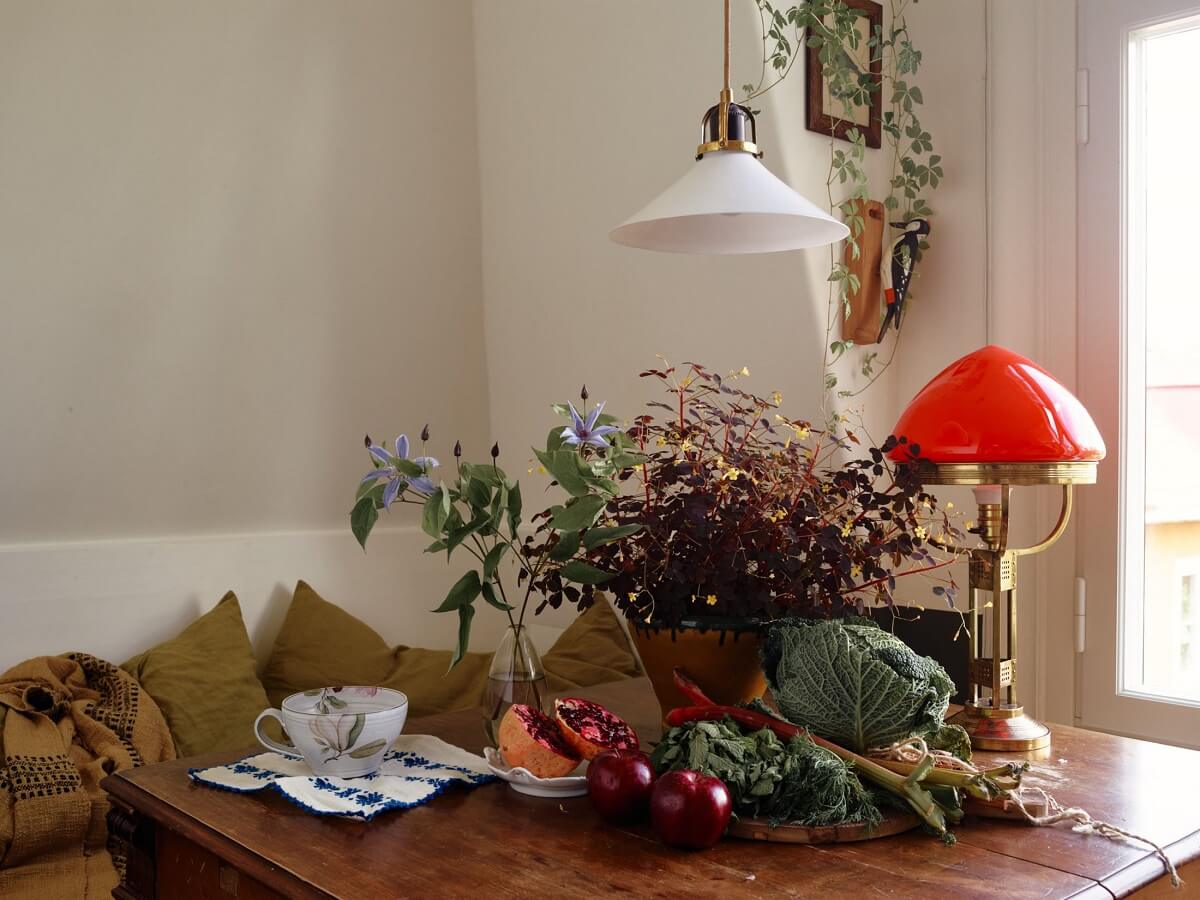 A Cozy Vintage Bohemian Maisonette in Sweden 15 kitchen-dining-nook-built-in-bench-nordroom
