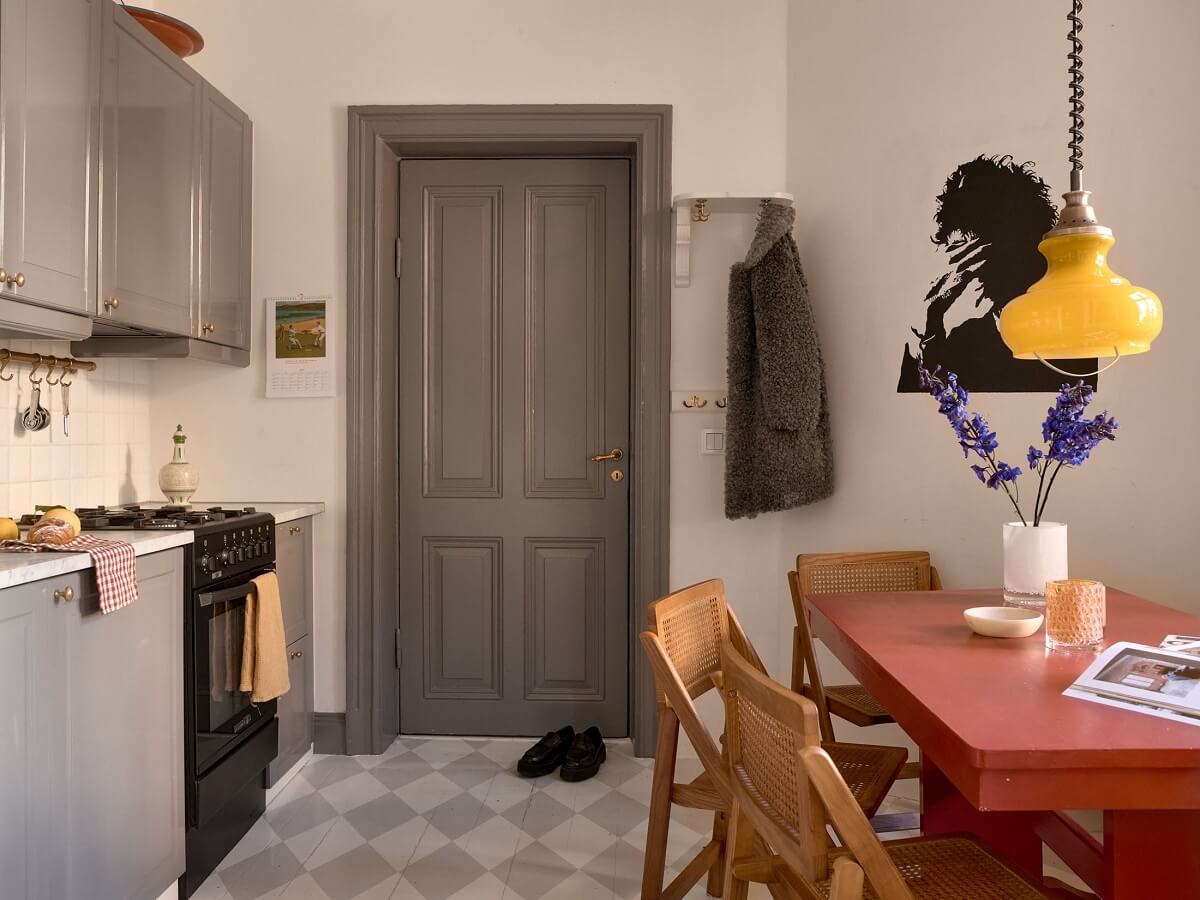 A Bedroom with Yellow French Wallpaper in a Small Scandi Home 8 kitchen-light-gray-white-checkerboard-floor-red-table-nordroom
