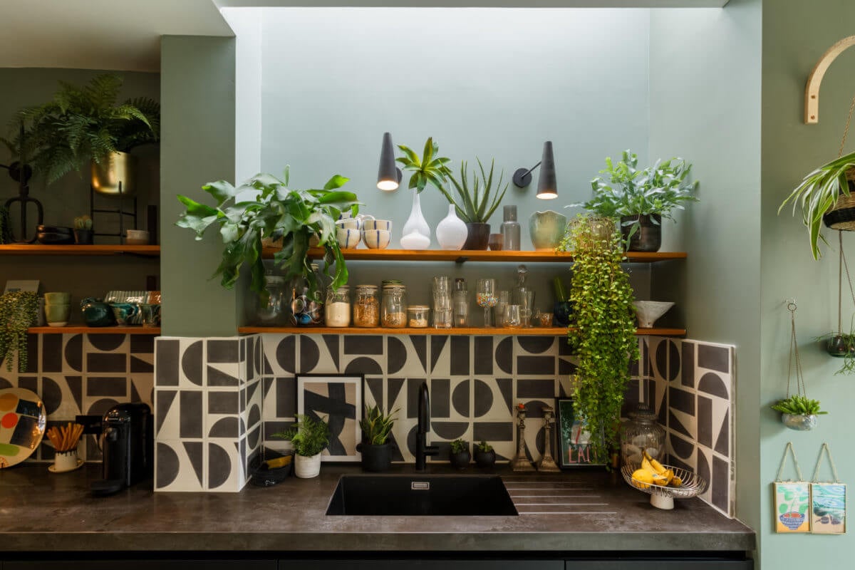 A Colorful Maximalist Home in London 9 kitchen-open-shelves-skylight-green-walls-black-white-tiles-nordroom