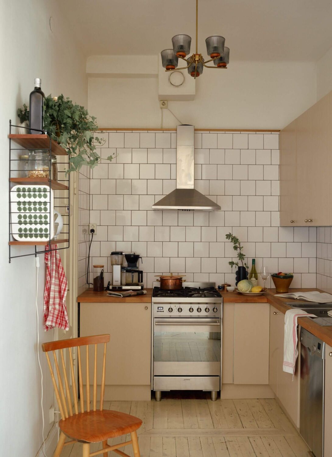 A Charming Apartment with Muted Blue Bedroom 10 kitchen-white-tiles-small-apartment-nordroom