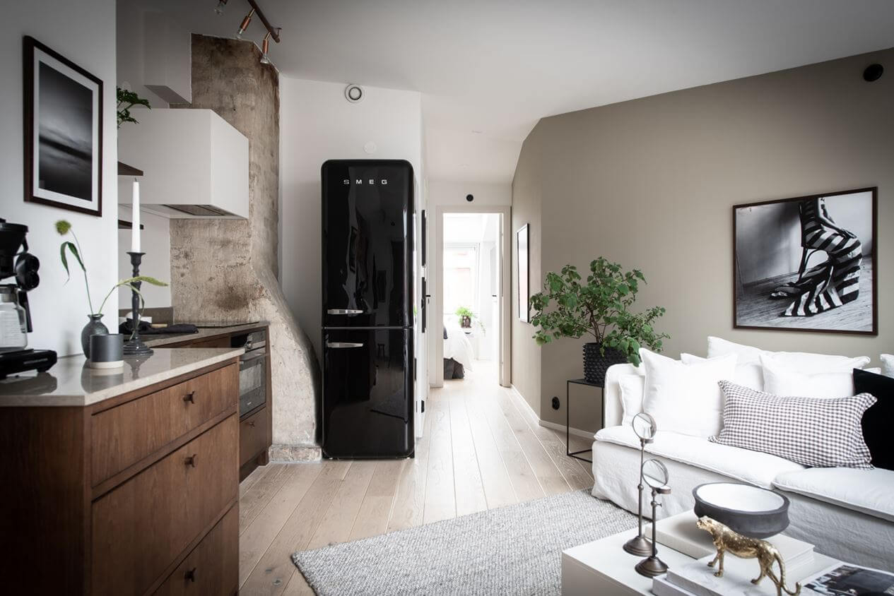 A Light Nordic Attic Loft with Raw Walls and Skylights 6 light-attic-apartment-walnut-kitchen-nordroom