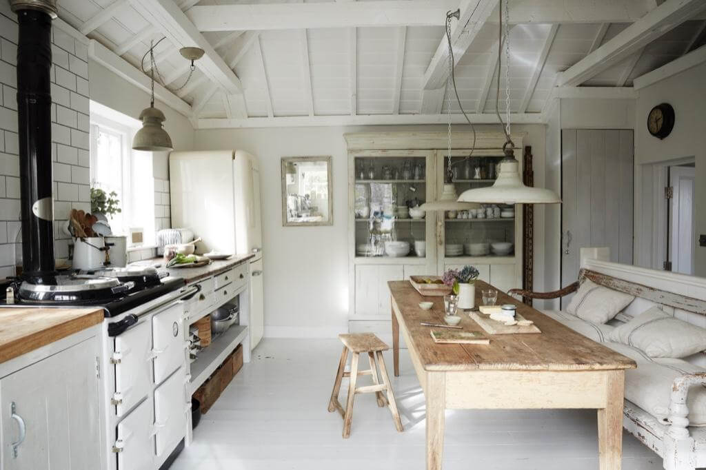 A Beautiful Seaside Cottage in Cornwall 5 light-cottage-kitchen-vintage-dining-bench-nordroom