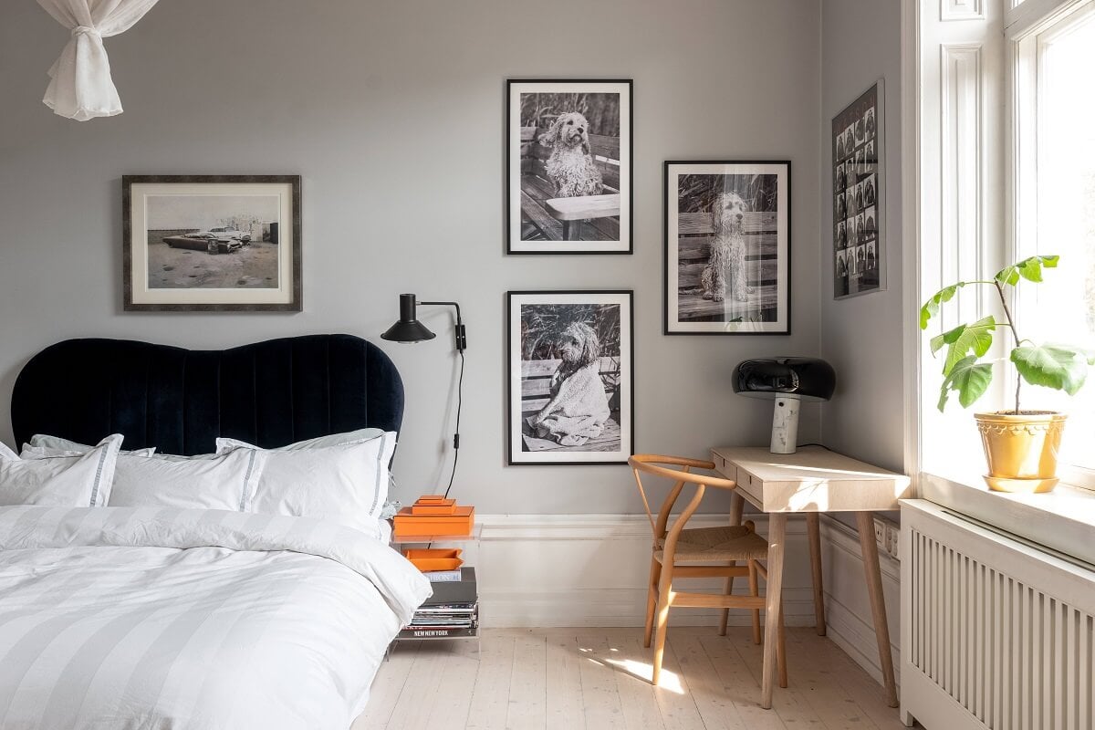 A Nordic Home with Blue Sitting Room and Kitchen 17 light-gray-bedroom-desk-green-velvet-headboard-nordroom