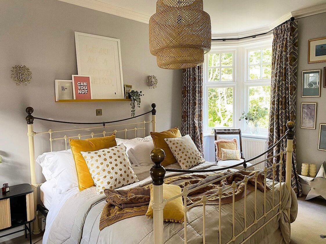 A Wonderful Eclectic Maximalist Home in England 21 light-gray-bedroom-yellow-accents-nordroom
