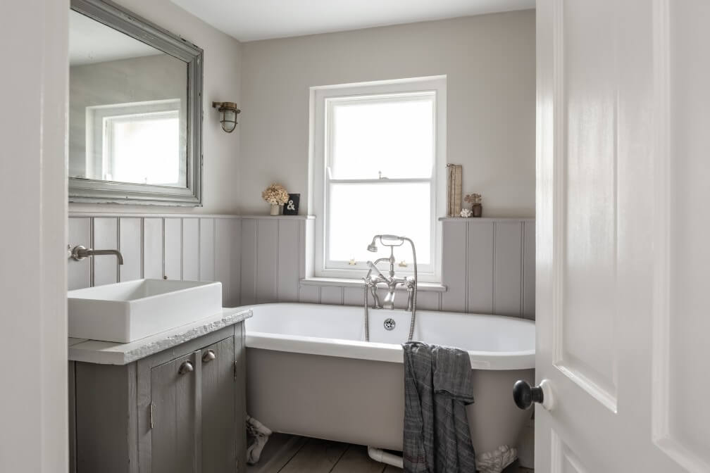 A Beautiful Seaside Cottage in Cornwall 9 light-gray-cottage-bathroom-freestanding-bath-nordroom