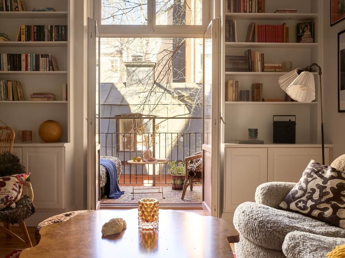 A Bedroom with Yellow French Wallpaper in a Small Scandi Home 6 living-room-built-in-bookshelves-balcony-nordroom