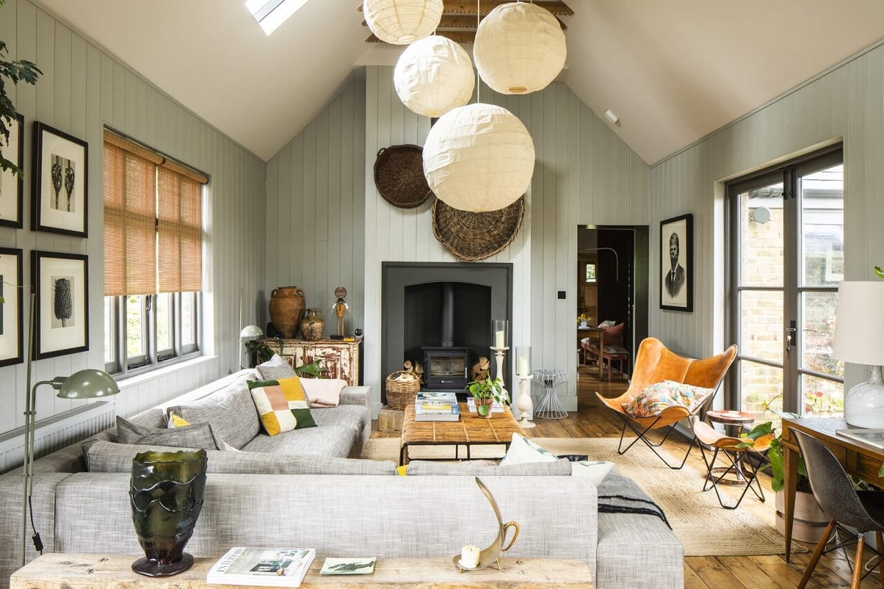 A Cozy Victorian Country House in England 5 living-room-corner-sofa-slanted-ceiling-fireplace-nordroom