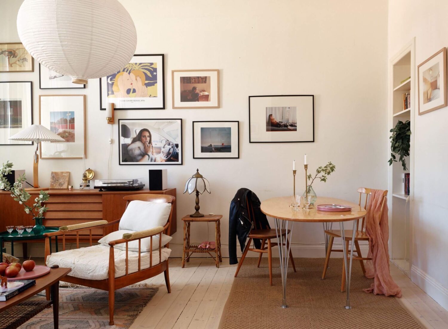A Charming Apartment with Muted Blue Bedroom 5 living-room-jute-rug-dining-space-nordroom