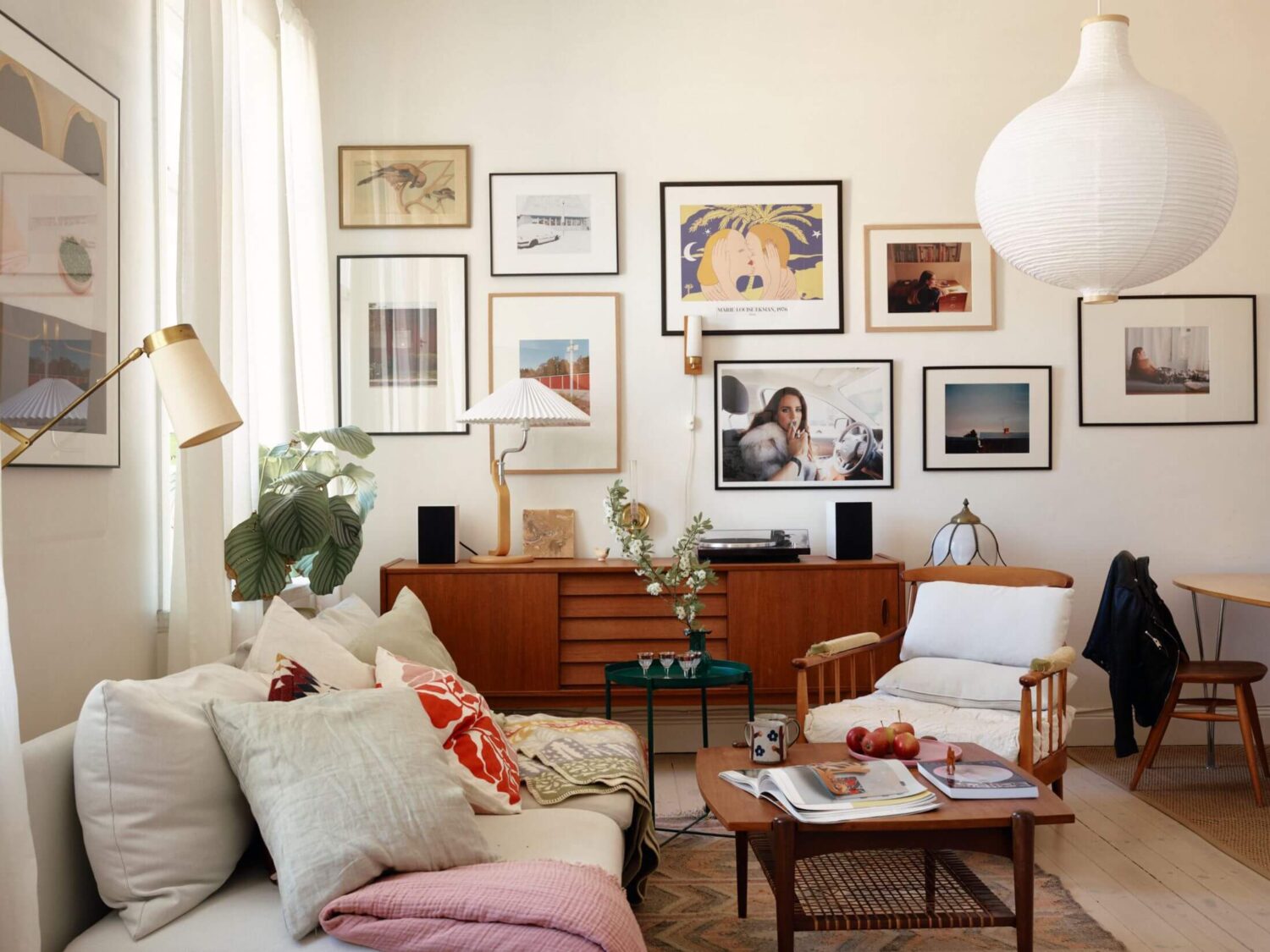 A Charming Apartment with Muted Blue Bedroom 3 living-room-midcentury-credenza-gallery-wall-nordroom