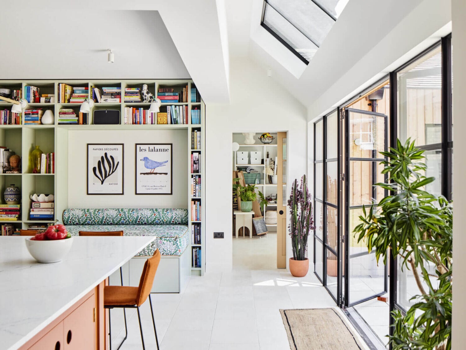 An Arts and Crafts House with Colorful Rooms 8 modern-kitchen-extension-skylights-built-in-bench-bookshelves-nordroom