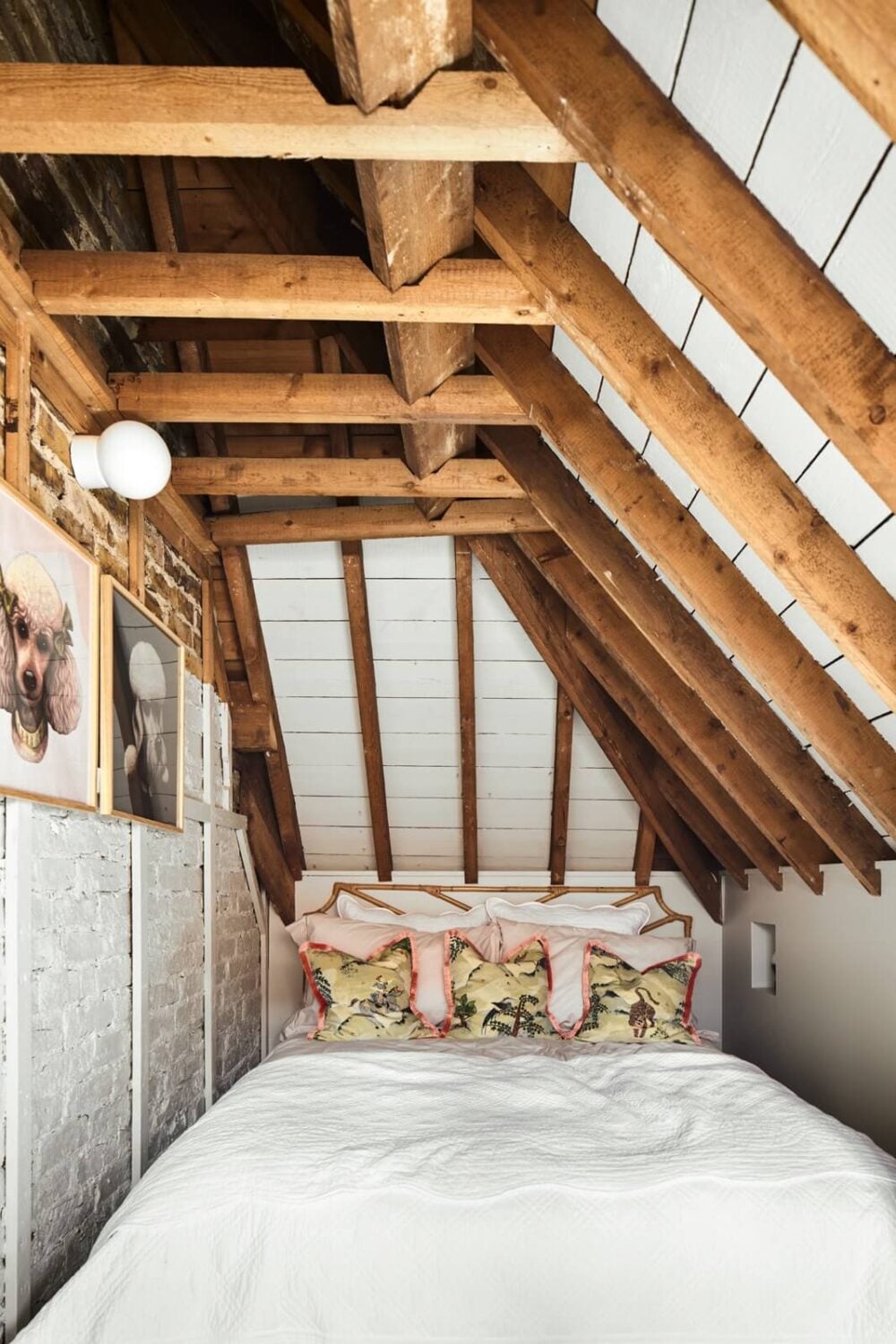 An Arts and Crafts House with Colorful Rooms 29 narrow-attic-bedroom-exposed-wooden-beams-nordroom