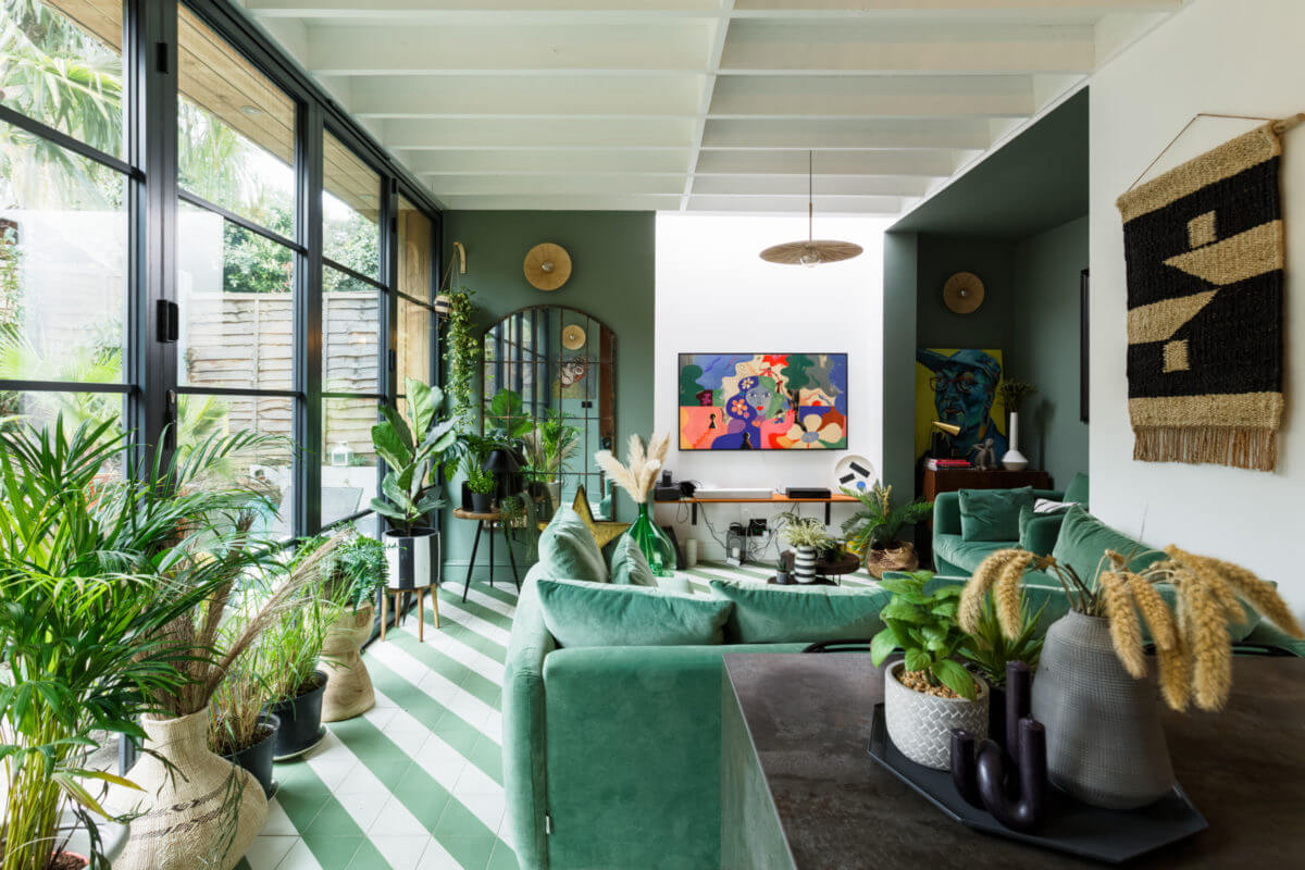 A Colorful Maximalist Home in London 14 open-plan-kitchen-sitting-room-diagonal-green-white-floor-tiles-plants-nordroom